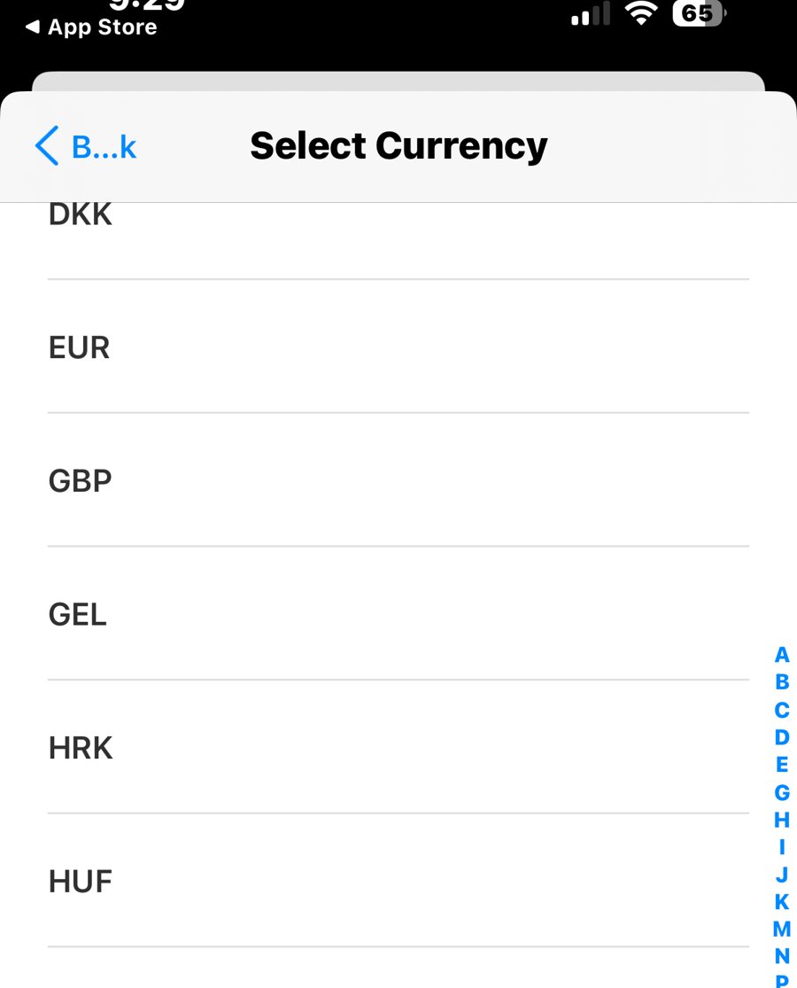 支払い通貨を選ぶ画面。DKK・EUR・GBP・GEL・HRK・HUFと並び、香港ドル(HKD)がない